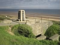 Omaha_Beach_Memorial_on_German_bunker.jpeg