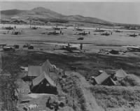 392nd's B-24s at Saipan Aug 1944, repair tents in foreground.PNG