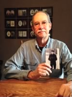 Thumbnail for HOPKINS-Tom Gray holds a picture of his cousin, Edwin Hopkins, who died during the attack on Pearl Harbor, Dec.7, 1941.jpg