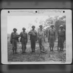 General Douglas Macarthur, Commander-In-Chief Of The Allied Forces In The Southwest Pacific Area On An Inspection Trip Of American Battle Fronts, Met Representativews Of Five Different American Indian Tribes In One United States Army Unit. Left To Right: - Page 3