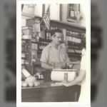 Abraham Itzkowitz in his Store c late 1930s.jpg
