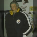 Earl with his favorite football team coat on