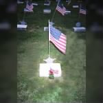 Flag at Charlies' Grave.jpg