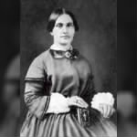 Mary Surratt in dress and displaying Bible.jpg