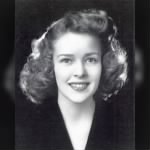 Marge Vattendahl's graduation picture,on the nose of Dick's P-38.jpg