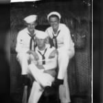 Bratton Watson right, Frank Ernie Bull Flowers Left is a Gunners Mate Name Unk WWII Buddies in Navy Whites.jpg