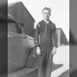 DAD SAILOR IN FRONT OF CAR AND BARN.jpg