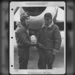 Major Walter C. Beckham (Left) De Funiak Springs, Fla., And S/Sgt. Henry E. Bush, Jr., Easley, Sc, Discuss Their Latest Mission In Front Of A Republic P-47 At An Air Base Somewhere In England. - Page 1