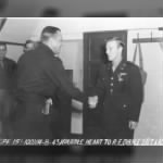 Lt Robert Dibble recoeves PURPLE HEART from Col Kessler 13 Aug.1943
