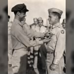 Roland L Greene receiving Air Medal from Col. Frank Kurtz, Italy, 1944