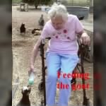 Lois Steele feeding a baby goat. March 2009